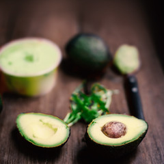 ..Food Background with fresh organic avocado on old wooden table