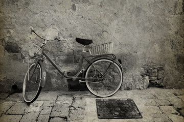 Obraz premium Vintage style photo of bicycle at the street