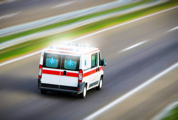 Fototapeta na wymiar Ambulance van on highway