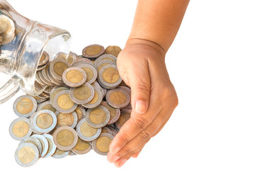 Fototapeta premium save money concept by hand put coin to money on white background