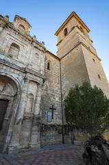 Fototapeta na wymiar Church of Our Lady of the Assumption (Nuestra Senora de La Asunción), Buendía, Cuenca, Spain. It was built in 18th century using limestone at the basement and sandstone to erect the walls.