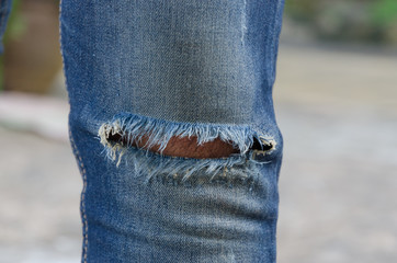 blue faded ripped jeans