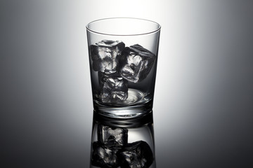empty glass with ice cubes