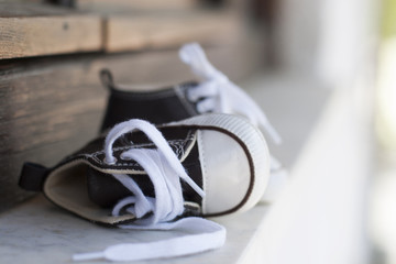 Sneakers child shoes / This image expresses the freedom and carefree children; concepts represented...