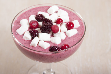 Smoothie of blackberries and cranberries with marshmallow