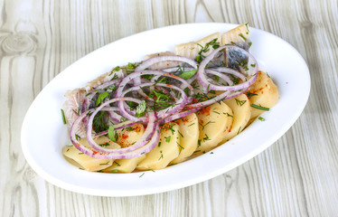 Herring with potato and onion