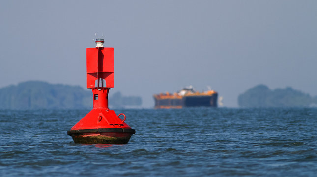 Close up of a red navigational buoy