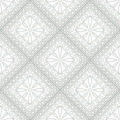 Seamless vector pattern. Symmetrical geometric background with grey rhombus and circles on the white backdrop. Decorative ornament.