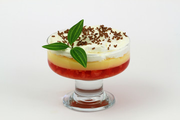 Traditional English strawberry trifle on white background

