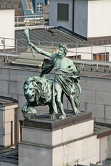 PRAGUE, CZECH REPUBLIC - APRIL 16, 2010: Statue on the top of Czech National Bank, view from Powder...
