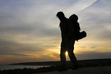 Fototapeta premium İt is a mans world with sunset