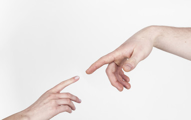 Fingers of Two People Nearly Touching