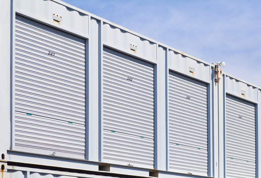 Exterior of white storage unit or small warehouse for rental