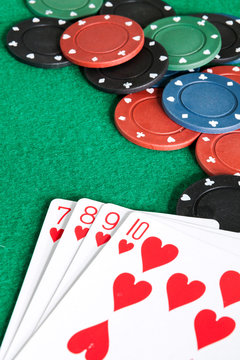 Image related to classic and online casino  games  on a game cards background from a player's perspective
