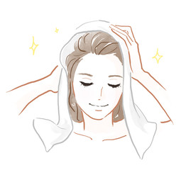 髪を乾かす女性