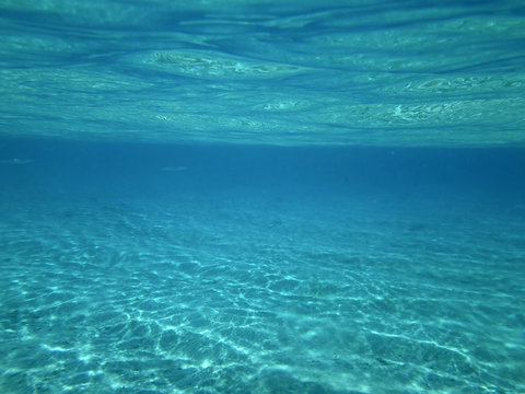 Matira beach below the water. Bora Bora, French Polynesia..