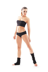 Young beautiful ballet dancer posing on a studio © matyuschenko