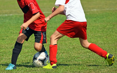 Obraz premium Kids are playing soccer