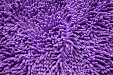 purple cleaning doormat or carpet texture