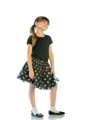Portrait of a smiling girl looking at the camera. Studio shot, isolated on white