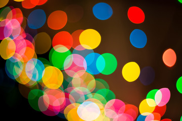 Lights blurred bokeh background from christmas night party