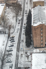 Snow-covered city's street bird's-eye view