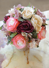 Red and Pink Fabric Roses on the table