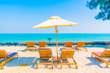 Umbrella pool and chair on the beach