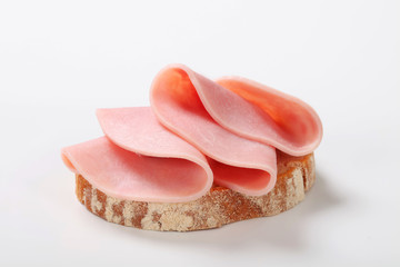 Slice of bread with ham
