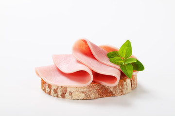 Slice of bread with ham