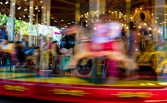 Blurred defocused background of traditional fairground vintage carousel