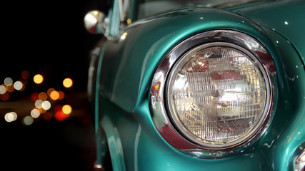 Vintage car and city lights