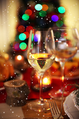 Wineglasses on a Christmas table setting, close up