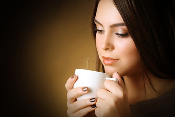 Portrait of pretty woman with cup of coffee