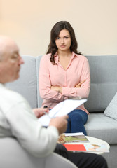 Young woman on reception at psychologist