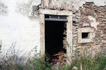 Fototapeta na wymiar Entrance to an abandoned house