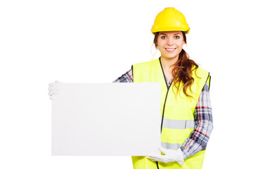 Young woman in construction helmet with nameplate