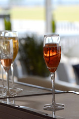 Champagne glasses on a bar counter