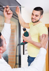 Male putting corbel at kitchen © JackF