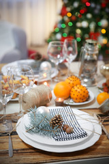 Table setting for Christmas dinner at home