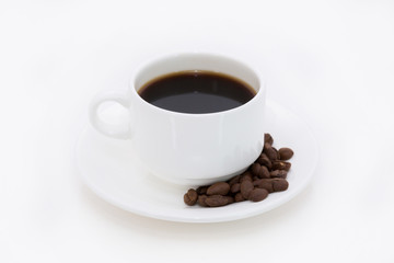 Coffee cup and beans on a white background