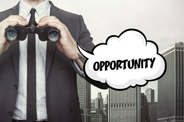 Opportunity text on speech bubble with businessman holding binoculars
