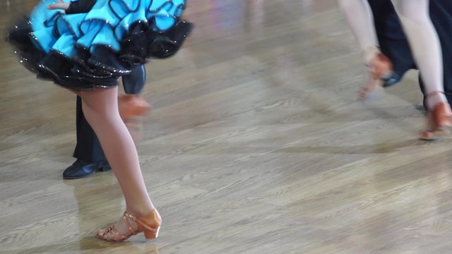 Dancers are dancing on the parquet