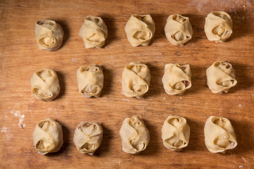 Raw Manti with meat inside (dumpling)