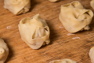 Raw Manti with meat inside (dumpling)