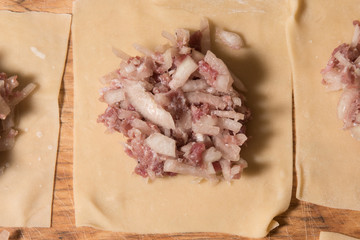 Raw Manti with meat inside (dumpling)