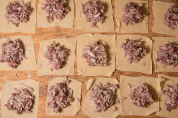 Raw Manti with meat inside (dumpling)