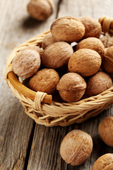 Walnuts on a grey wooden table