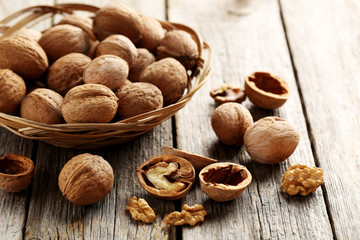 Walnuts on a grey wooden table