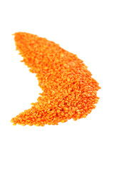 Red lentils isolated on a white